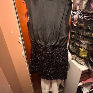 Chic Black Sleeveless Dress with Sequin Skirt